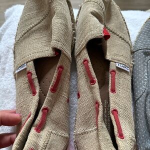TOMS Beige Slip-On Shoes with Red Accents